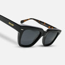 TRAVIS LOGO SUNGLASSES BLACK TORTOISE